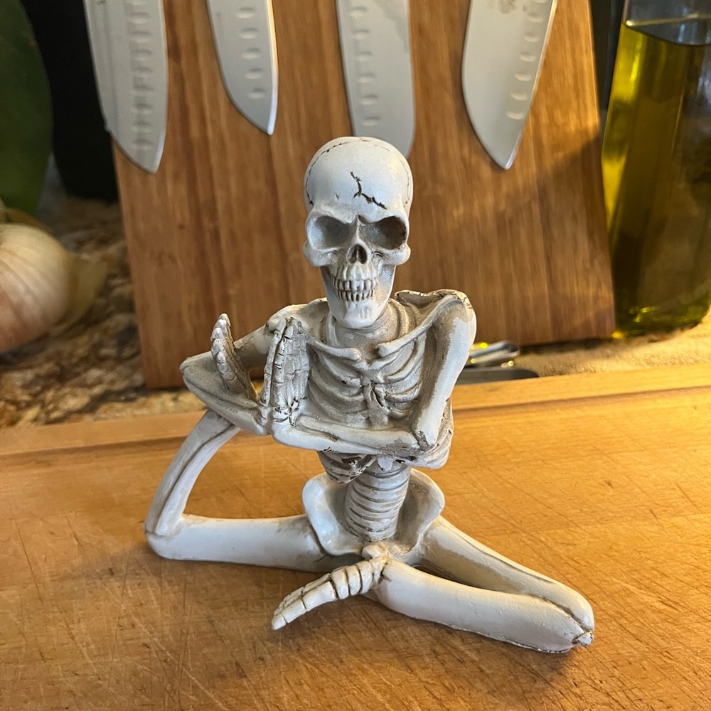 Cute yoga skeleton